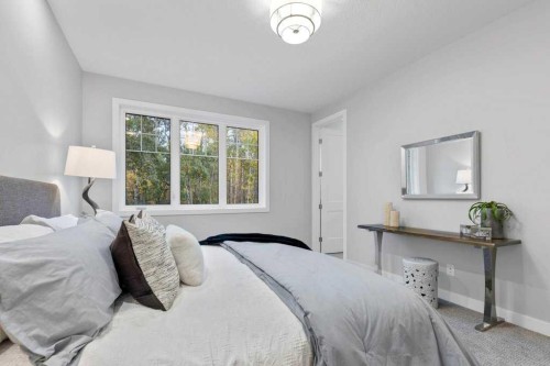 182 Slopeside Drive, Rural Lacombe County, AB - Indoor Photo Showing Bedroom