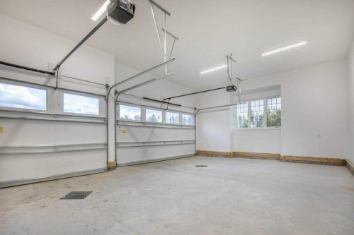182 Slopeside Drive, Rural Lacombe County, AB - Indoor Photo Showing Garage