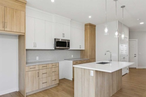 73 Southborough Square, Cochrane, AB - Indoor Photo Showing Kitchen