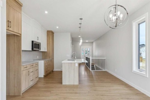 73 Southborough Square, Cochrane, AB - Indoor Photo Showing Kitchen
