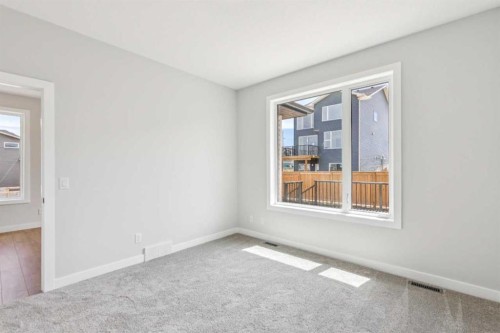 73 Southborough Square, Cochrane, AB - Indoor Photo Showing Other Room