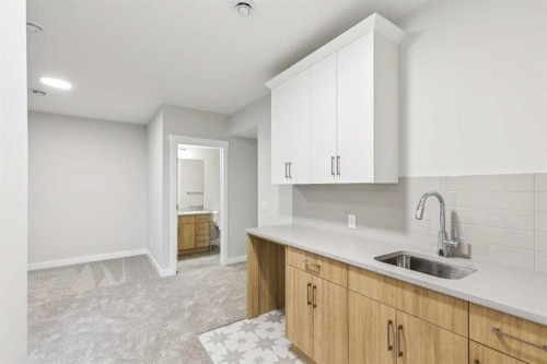 73 Southborough Square, Cochrane, AB - Indoor Photo Showing Kitchen