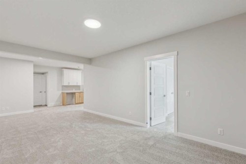 73 Southborough Square, Cochrane, AB - Indoor Photo Showing Other Room
