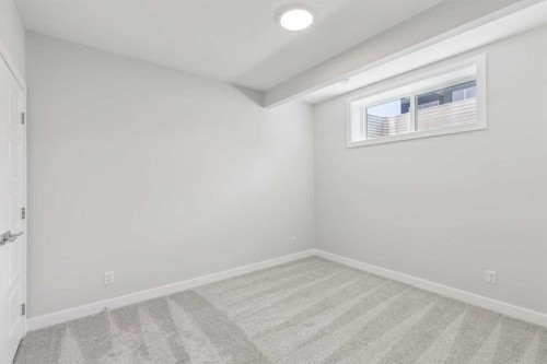 73 Southborough Square, Cochrane, AB - Indoor Photo Showing Other Room