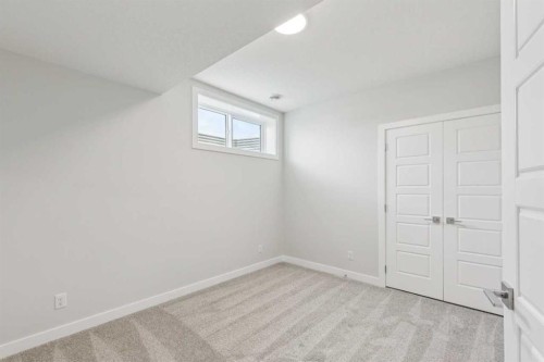 73 Southborough Square, Cochrane, AB - Indoor Photo Showing Other Room