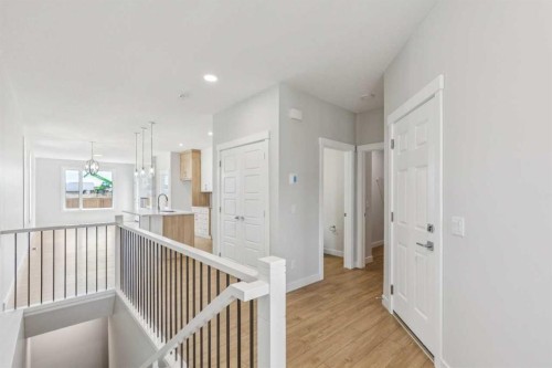 73 Southborough Square, Cochrane, AB - Indoor Photo Showing Other Room