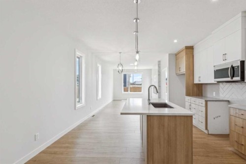 73 Southborough Square, Cochrane, AB - Indoor Photo Showing Kitchen