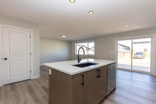 224 Augustus Way, Penhold, AB - Indoor Photo Showing Kitchen With Double Sink