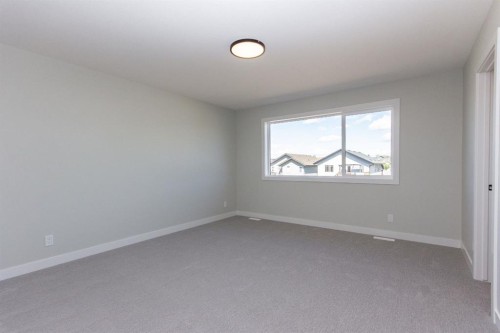 224 Augustus Way, Penhold, AB - Indoor Photo Showing Other Room