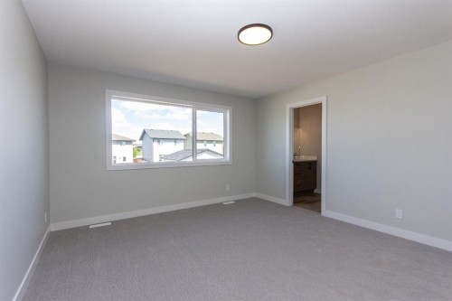 224 Augustus Way, Penhold, AB - Indoor Photo Showing Other Room