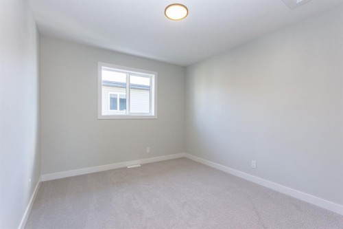 224 Augustus Way, Penhold, AB - Indoor Photo Showing Other Room