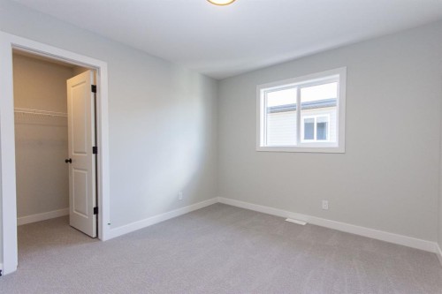 224 Augustus Way, Penhold, AB - Indoor Photo Showing Other Room