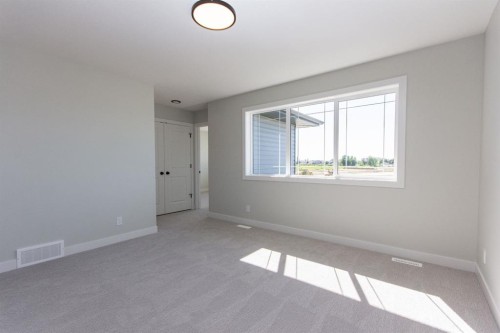 224 Augustus Way, Penhold, AB - Indoor Photo Showing Other Room