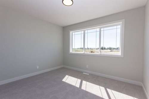 224 Augustus Way, Penhold, AB - Indoor Photo Showing Other Room