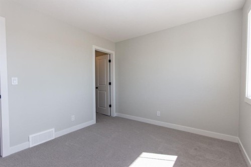 224 Augustus Way, Penhold, AB - Indoor Photo Showing Other Room