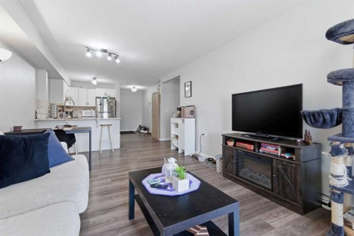 223A-80 Kelloway Crescent, Red Deer, AB - Indoor Photo Showing Living Room