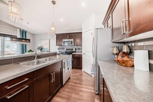 21 Valley Crescent, Blackfalds, AB - Indoor Photo Showing Kitchen With Double Sink
