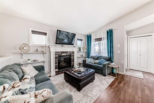 21 Valley Crescent, Blackfalds, AB - Indoor Photo Showing Living Room With Fireplace