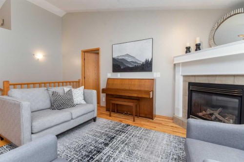 90 Alberts Close, Red Deer, AB - Indoor Photo Showing Living Room With Fireplace