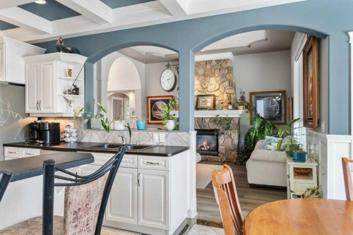 58 Lagrange Crescent, Red Deer, AB - Indoor Photo Showing Dining Room With Fireplace