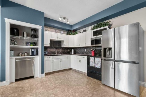 58 Lagrange Crescent, Red Deer, AB - Indoor Photo Showing Kitchen
