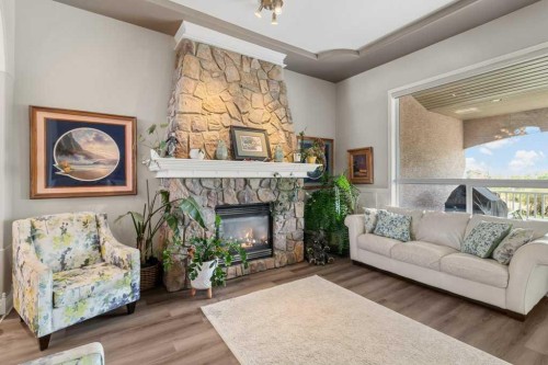 58 Lagrange Crescent, Red Deer, AB - Indoor Photo Showing Living Room With Fireplace