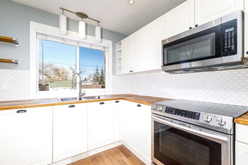 55 Patterson Crescent, Red Deer, AB - Indoor Photo Showing Kitchen With Double Sink
