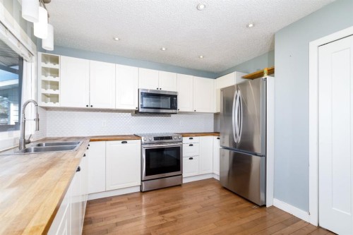 55 Patterson Crescent, Red Deer, AB - Indoor Photo Showing Kitchen With Stainless Steel Kitchen With Double Sink