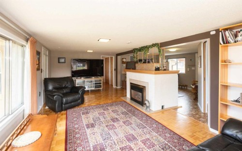 2731 6 Street, Calling Lake, AB - Indoor Photo Showing Living Room With Fireplace