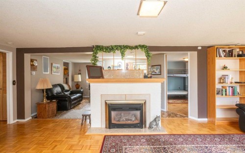 2731 6 Street, Calling Lake, AB - Indoor Photo Showing Living Room With Fireplace