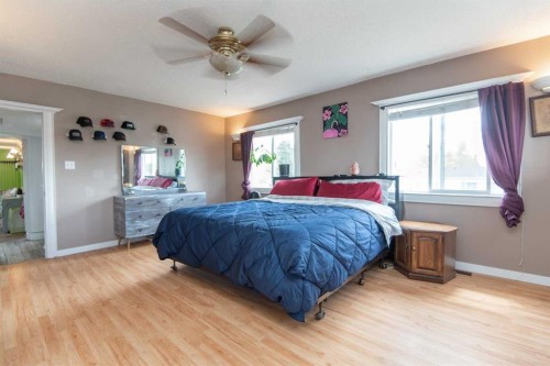 5024 49 Street, Clive, AB - Indoor Photo Showing Bedroom
