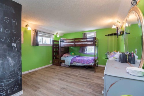 5024 49 Street, Clive, AB - Indoor Photo Showing Bedroom