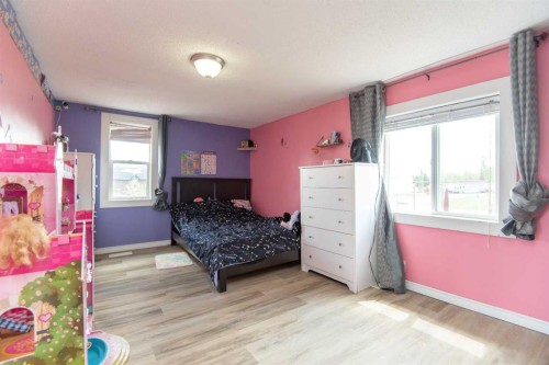 5024 49 Street, Clive, AB - Indoor Photo Showing Bedroom