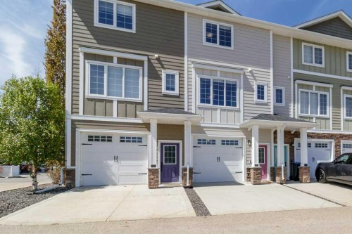 113-5210 Lakeshore Drive, Sylvan Lake, AB - Outdoor With Facade