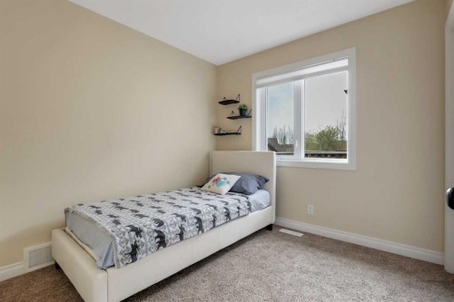 23 Lambertson Place, Sylvan Lake, AB - Indoor Photo Showing Bedroom