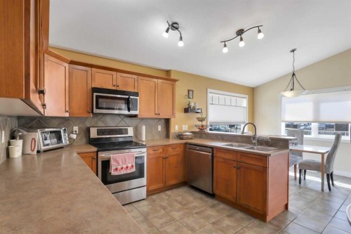 23 Lambertson Place, Sylvan Lake, AB - Indoor Photo Showing Kitchen With Double Sink