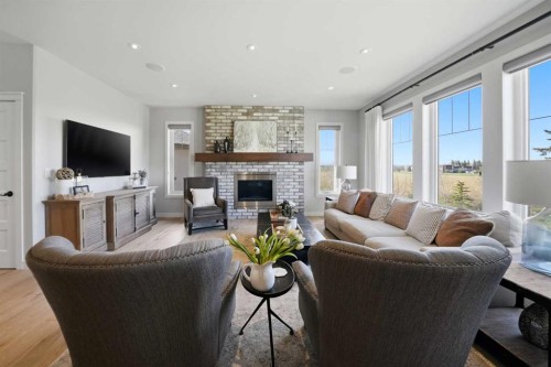 28 Sawyer Close, Red Deer, AB - Indoor Photo Showing Living Room With Fireplace