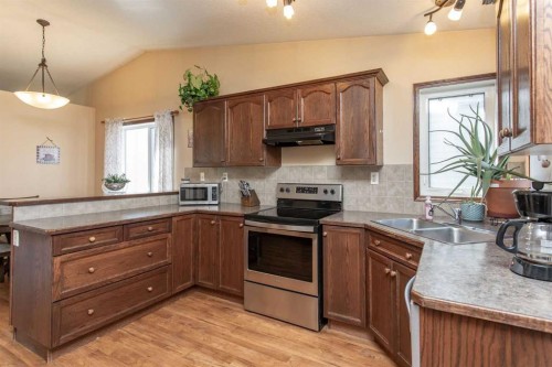 143 Inkster Close, Red Deer, AB - Indoor Photo Showing Kitchen With Double Sink