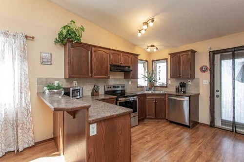 143 Inkster Close, Red Deer, AB - Indoor Photo Showing Kitchen With Double Sink