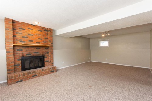 35 Oyen Crescent, Red Deer, AB - Indoor With Fireplace