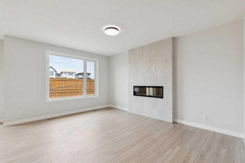 271 Bridgeport Circle, Chestermere, AB - Indoor Photo Showing Other Room With Fireplace