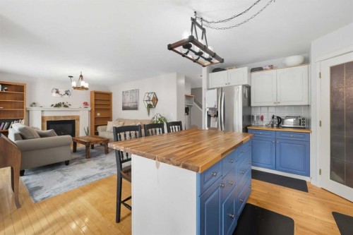 65 Asmundsen Avenue, Red Deer, AB - Indoor With Fireplace