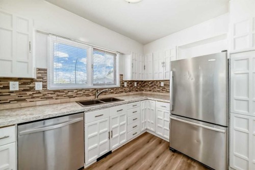 2 Nichols Crescent, Red Deer, AB - Indoor Photo Showing Kitchen With Double Sink