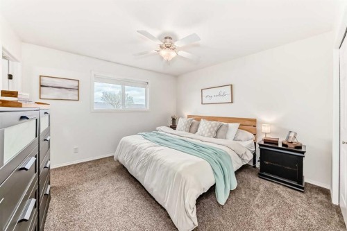 6 Timmons Close, Lacombe, AB - Indoor Photo Showing Bedroom