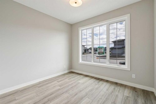 400 Fireside Drive, Cochrane, AB - Indoor Photo Showing Other Room