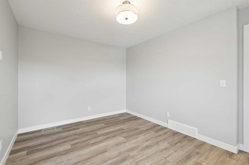 400 Fireside Drive, Cochrane, AB - Indoor Photo Showing Other Room