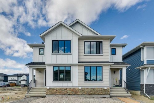 400 Fireside Drive, Cochrane, AB - Outdoor With Facade