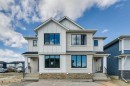 400 Fireside Drive, Cochrane, AB  - Outdoor With Facade 