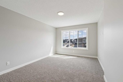 400 Fireside Drive, Cochrane, AB - Indoor Photo Showing Other Room