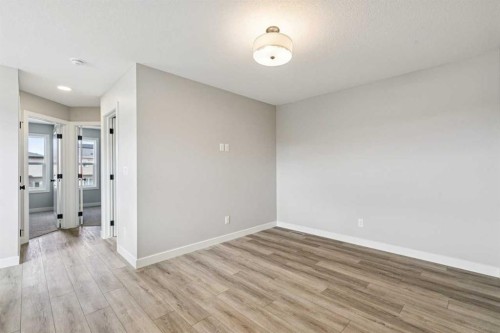 400 Fireside Drive, Cochrane, AB - Indoor Photo Showing Other Room